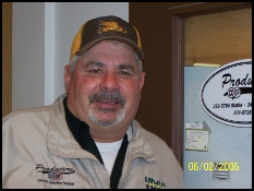 middle-aged man wearing a brown cap